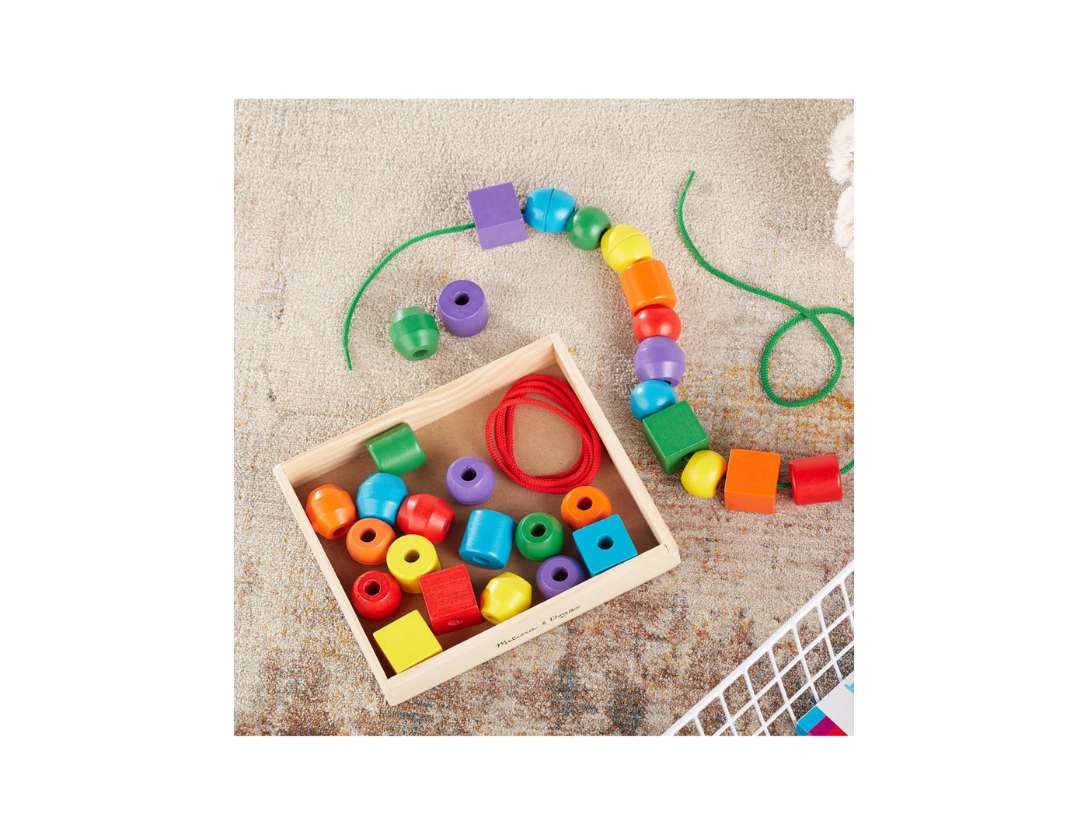 Set de cuentas Melissa & Doug, con 30 cuentas y 2 cordones